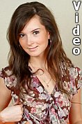 Nubile Carey takes off her dress to masturbate