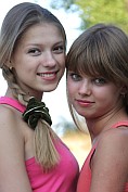 Lovely teenage girls strip and play together for our pleasure