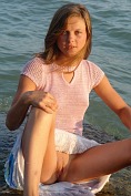 Sexy teen Petra E gets wet and shows her pussy