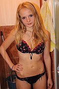 Gorgeous teen Goldie undresses and then masturbates in the shower