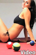 Sammi-Jo plays pool on video