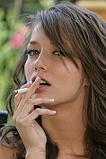 Malena Morgan smokes and strips in the garden
