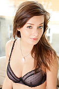 Pretty girl takes off her bra and her knickers for us