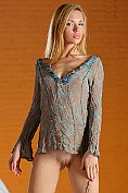 Slender blonde shows off her naked body