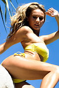 Jesse Jay showing off in her yellow bikini