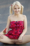 Cute blonde Gloia flashes her boobs and pussy