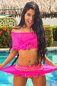 Ambar Suarez shows off by the pool
