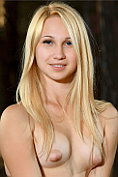 Blonde teen Belonika strips naked in the woods