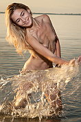Davina C strips naked and gets in to the water